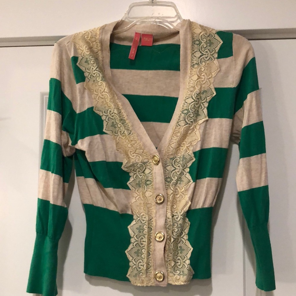 Striped cardigan with lace detail.